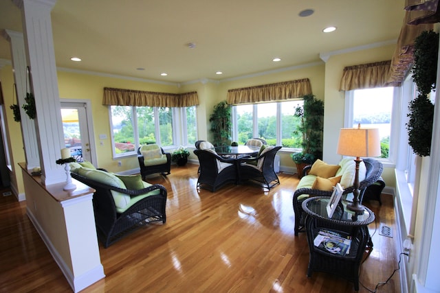 1564 Tranquility Trl, Dandridge, TN 37725 - living room with light wood-style flooring, recessed lighting, baseboards, decorative columns, and crown molding