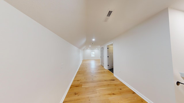 hallway featuring light wood-type flooring