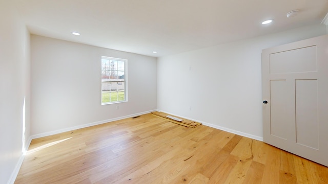 empty room featuring light hardwood / wood-style floors