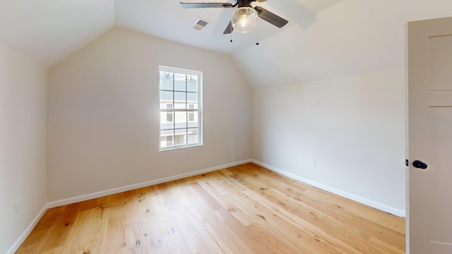 additional living space featuring ceiling fan, light hardwood / wood-style floors, and lofted ceiling