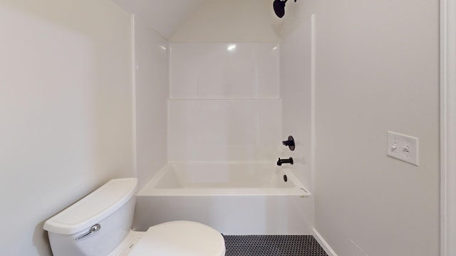 bathroom with shower / bathing tub combination and toilet