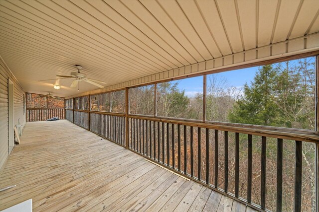 sunroom featuring plenty of natural light and ceiling fan