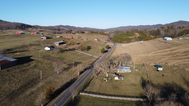 bird's eye view with a rural view and a mountain view