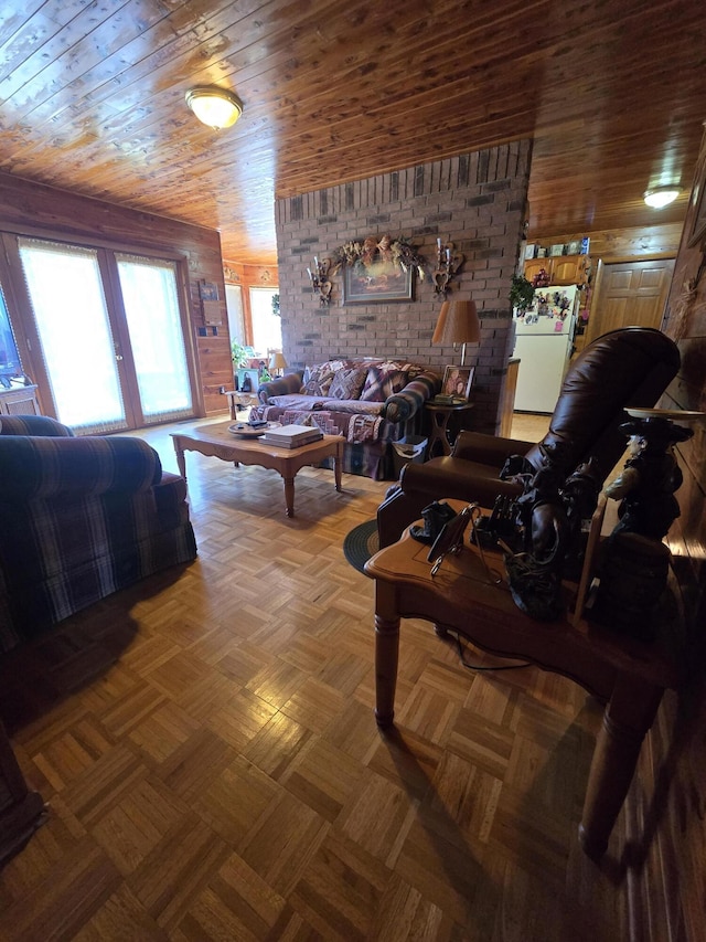 living area featuring french doors and wooden ceiling
