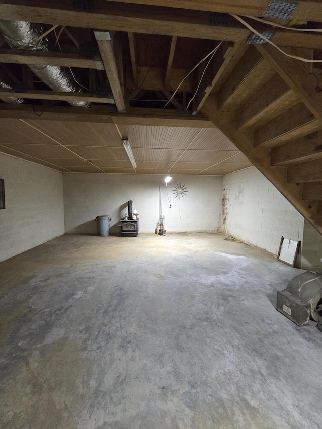 below grade area with concrete block wall