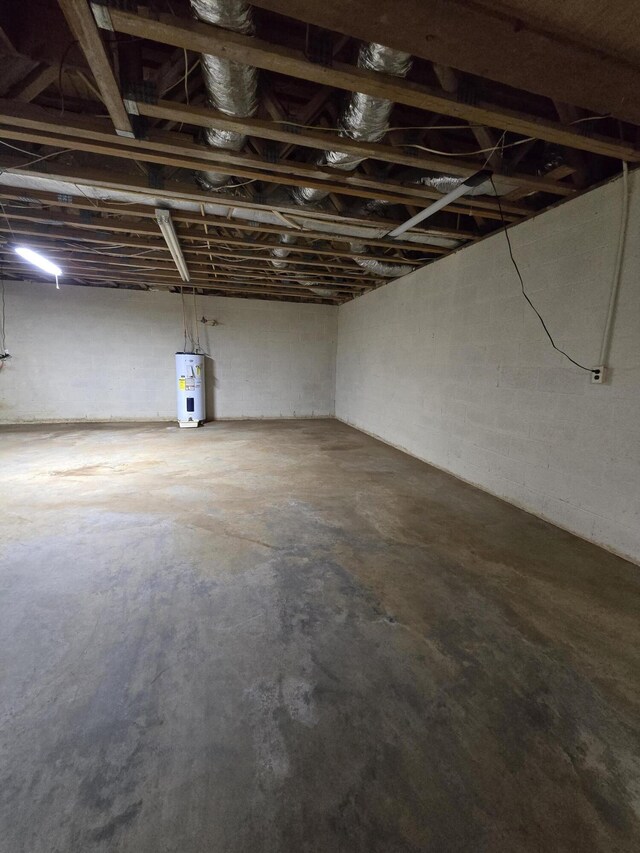 unfinished basement with water heater