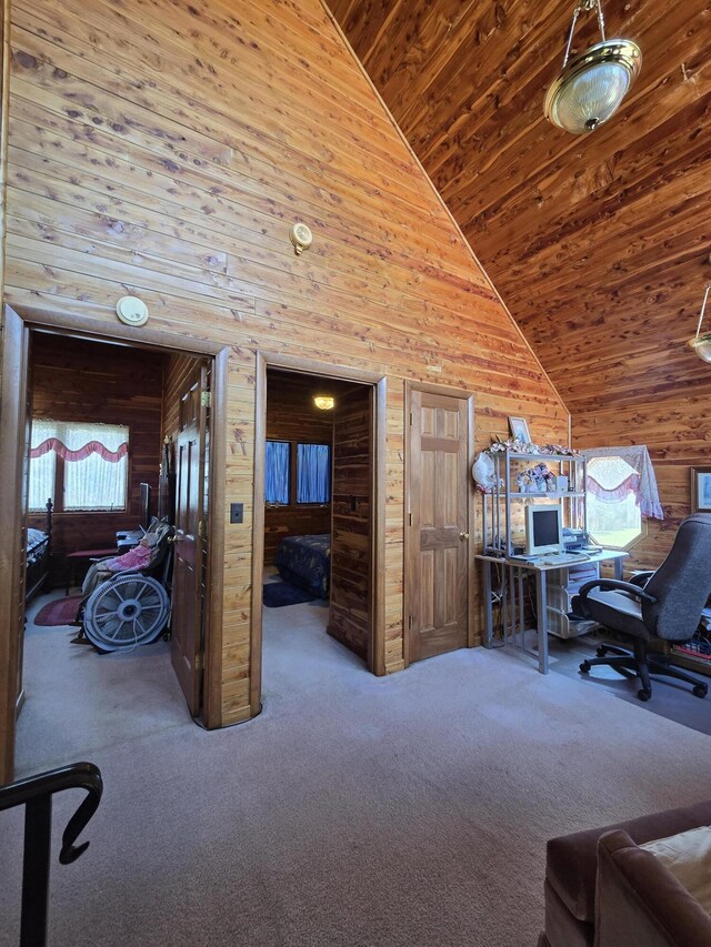 office featuring wood ceiling, high vaulted ceiling, wooden walls, and carpet flooring