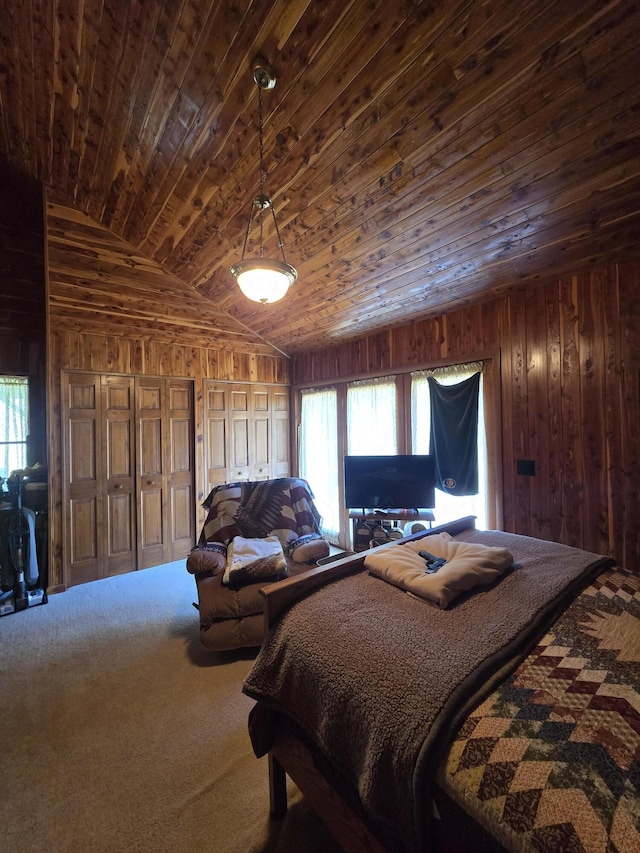 bedroom with wood walls, multiple windows, and wooden ceiling
