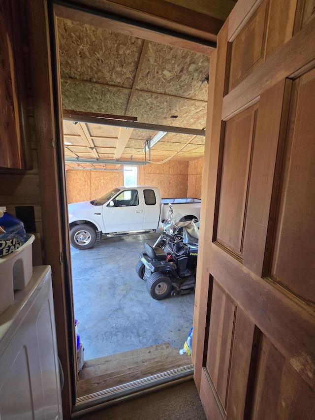 interior space featuring concrete floors and separate washer and dryer