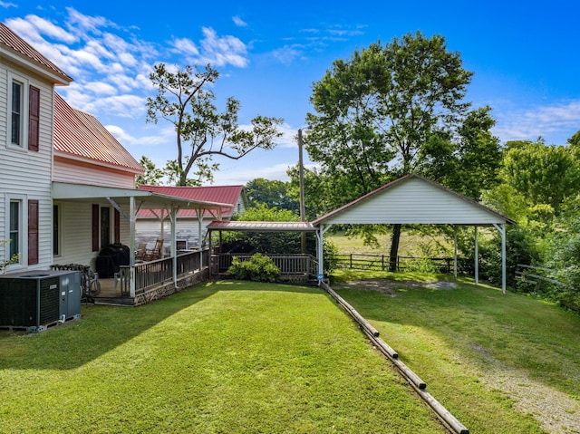 view of yard featuring central AC