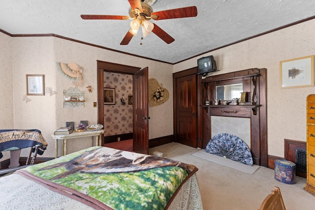 bedroom featuring ceiling fan, ornamental molding, a textured ceiling, and light carpet