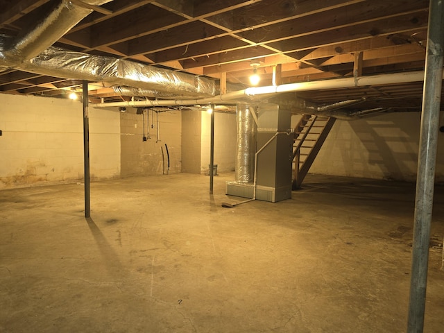 basement featuring heating unit