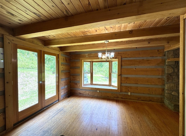453 Trentham Hollow Rd, Parrottsville, TN 37843 - spare room with light wood-type flooring, a chandelier, french doors, wood walls, and a wood ceiling with exposed beams