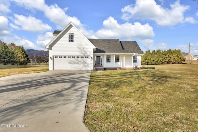 traditional home featuring a garage, a front yard, and driveway