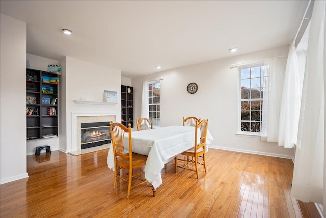 dining area with light hardwood / wood-style floors