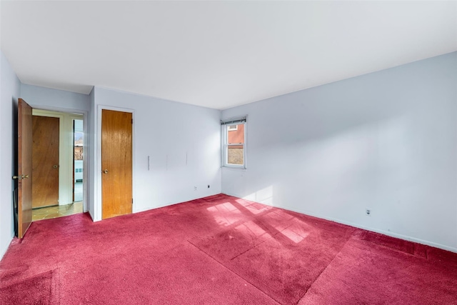 spare room with carpet flooring