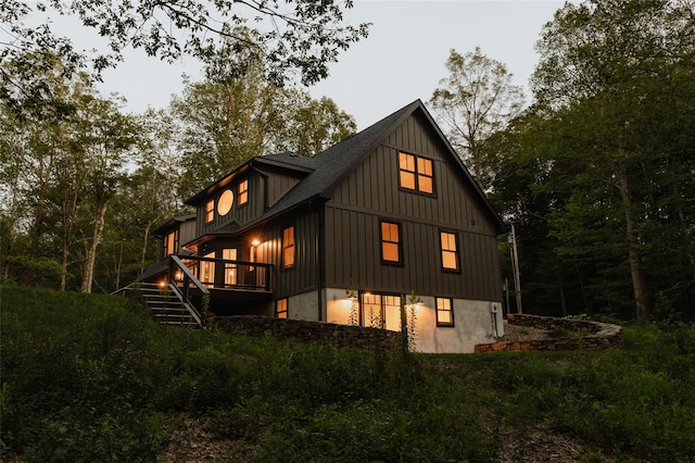 rear view of house with a deck