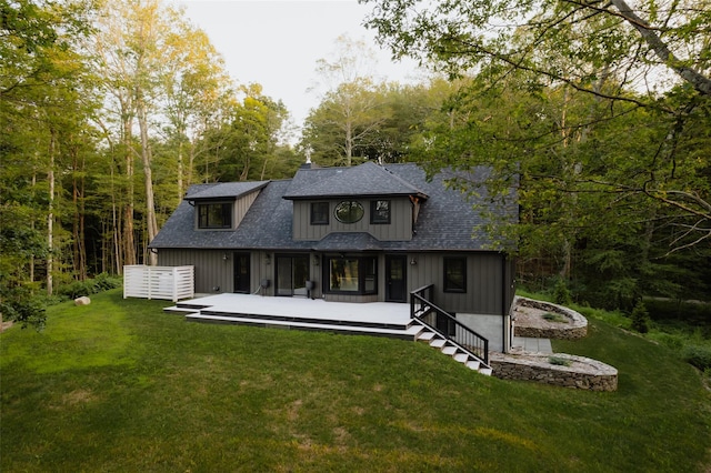 exterior space with a lawn and a wooden deck