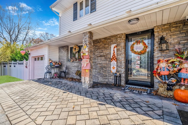 property entrance with a garage