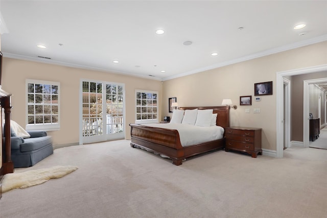 carpeted bedroom featuring access to outside and ornamental molding