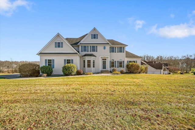 view of front of property featuring a front yard