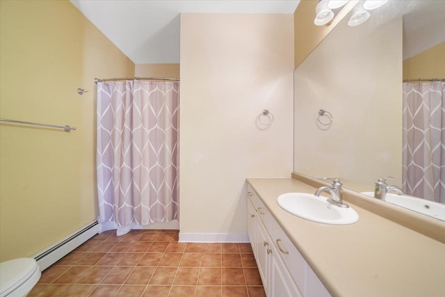 bathroom with vanity, toilet, baseboard heating, and walk in shower