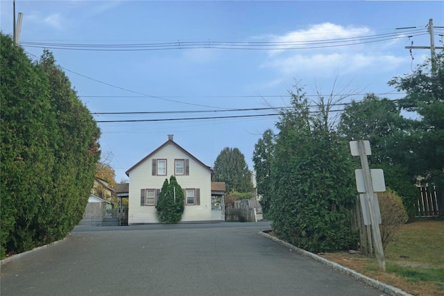 view of front of home with fence