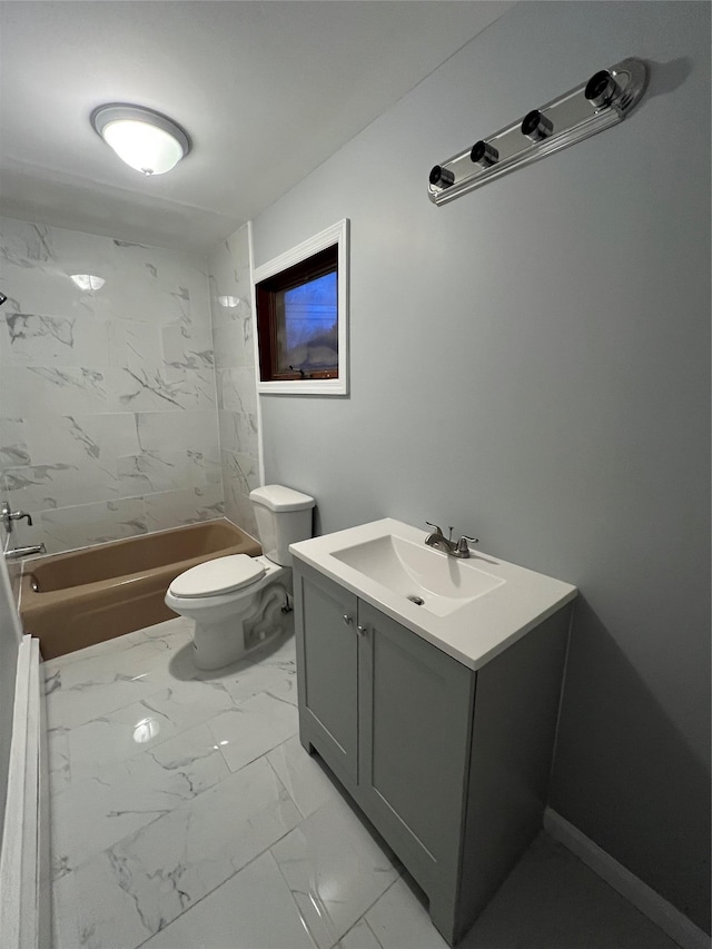 full bathroom featuring vanity, toilet, and tiled shower / bath combo