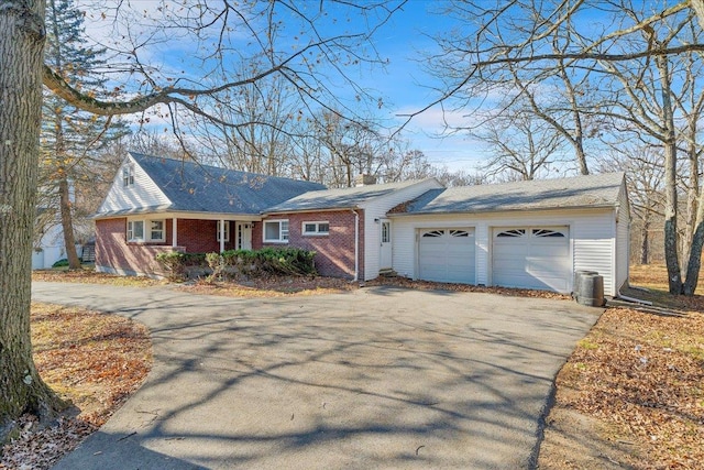 single story home featuring a garage