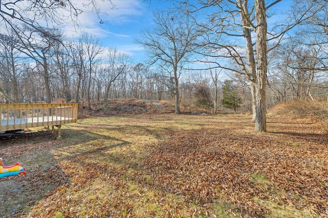 view of yard featuring a deck