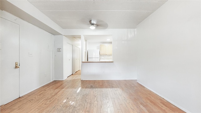 corridor featuring light wood-type flooring