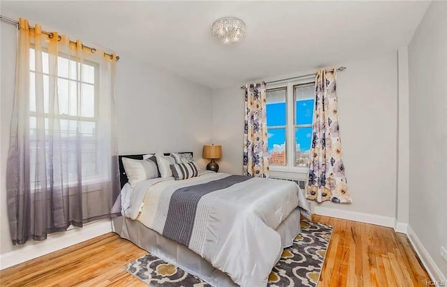 bedroom featuring wood-type flooring