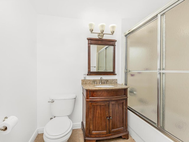 full bathroom featuring tile patterned flooring, vanity, toilet, and enclosed tub / shower combo