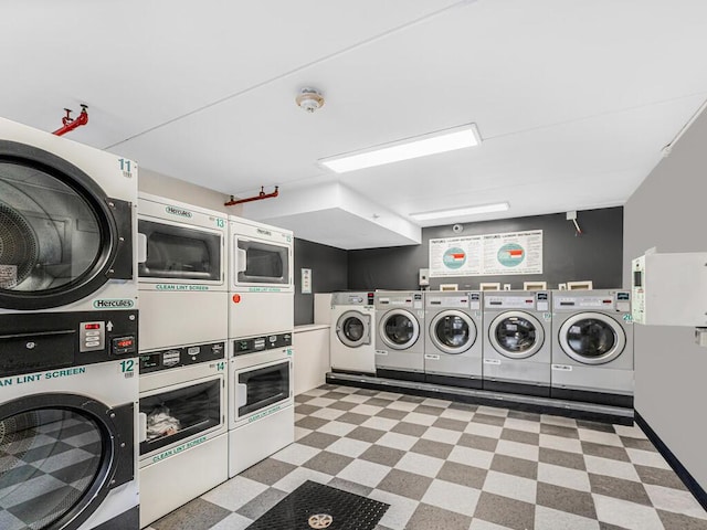 clothes washing area with independent washer and dryer and stacked washer and dryer