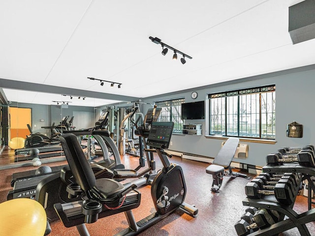 gym featuring track lighting