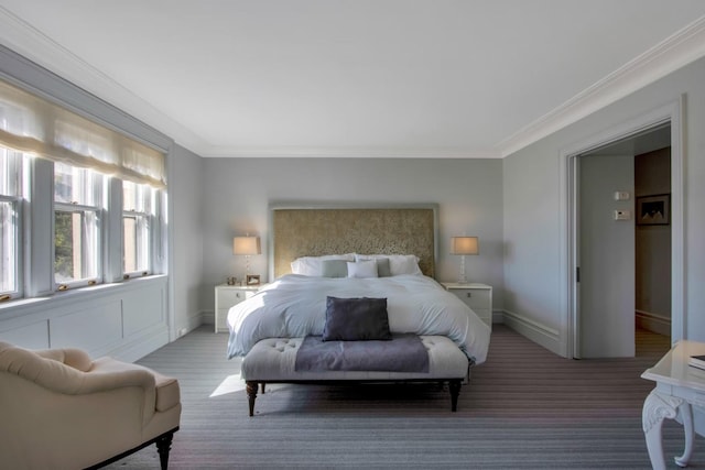 bedroom featuring crown molding