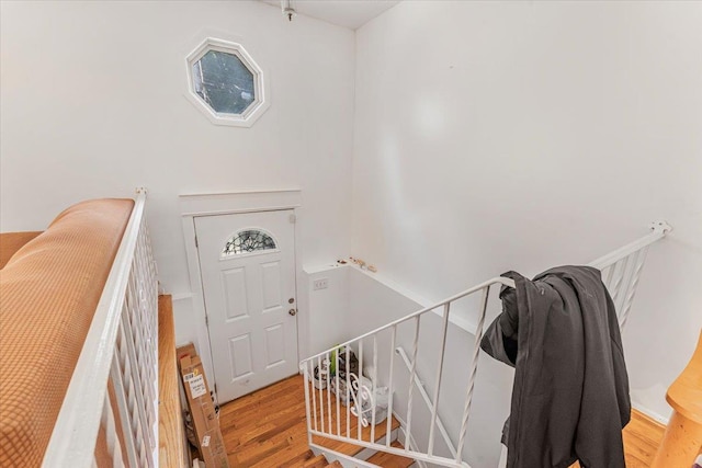 foyer entrance with light hardwood / wood-style flooring