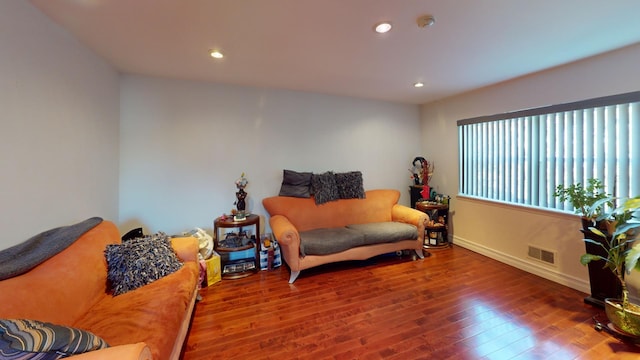 living area featuring hardwood / wood-style flooring