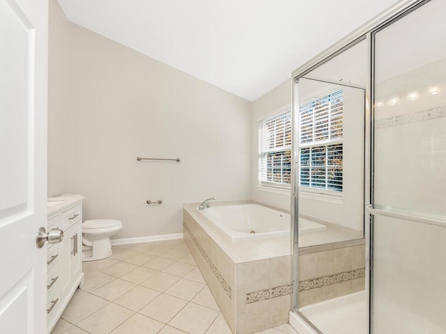 full bathroom with vanity, vaulted ceiling, tile patterned flooring, toilet, and shower with separate bathtub