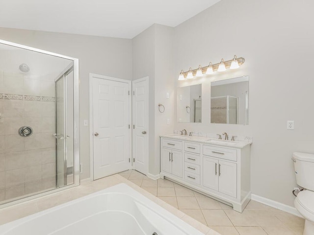 full bathroom featuring vanity, tile patterned floors, vaulted ceiling, toilet, and shower with separate bathtub