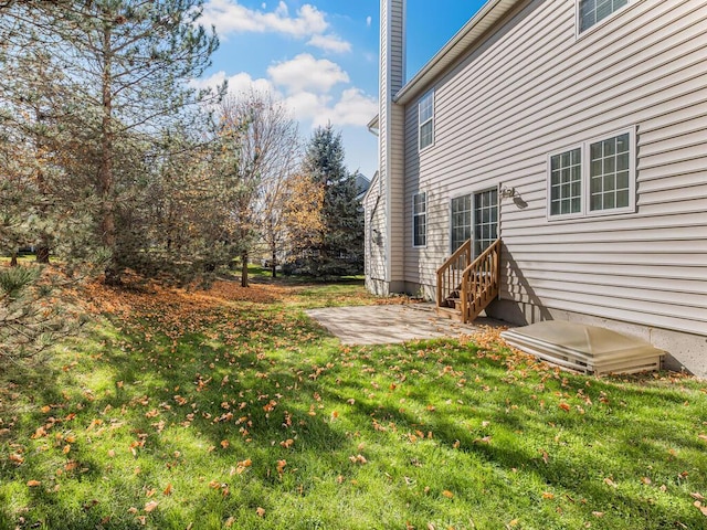 view of yard with a patio area