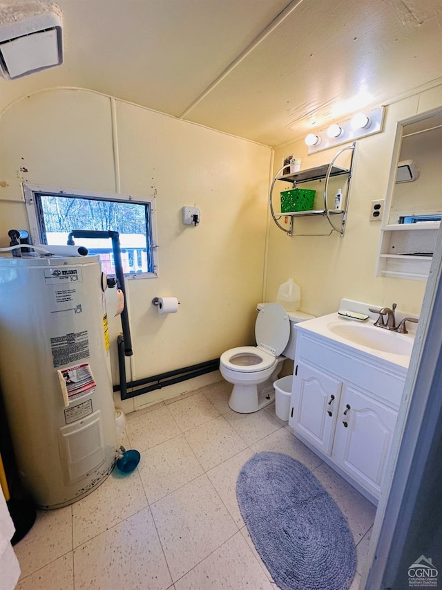 bathroom with water heater, vanity, and toilet