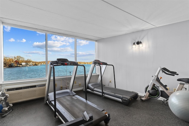 workout room with a water view