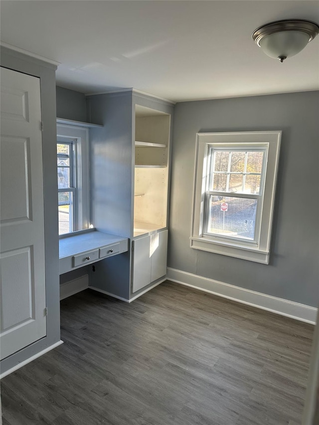 13 Farries Ave, Florida, NY 10921 - unfurnished bedroom featuring dark wood-style flooring and built in study area
