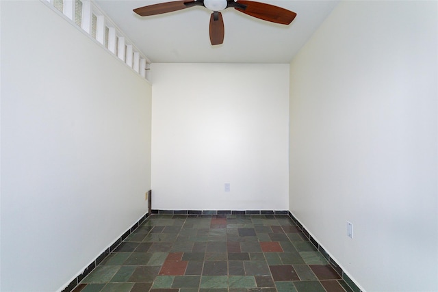 spare room featuring ceiling fan