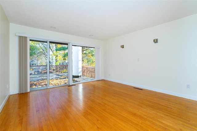 empty room with light wood-type flooring