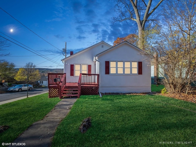 view of front of property with a front lawn