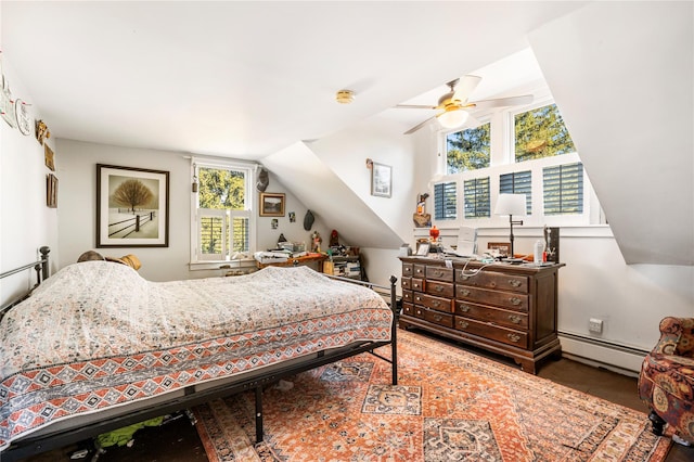 bedroom featuring a baseboard radiator, vaulted ceiling, and ceiling fan