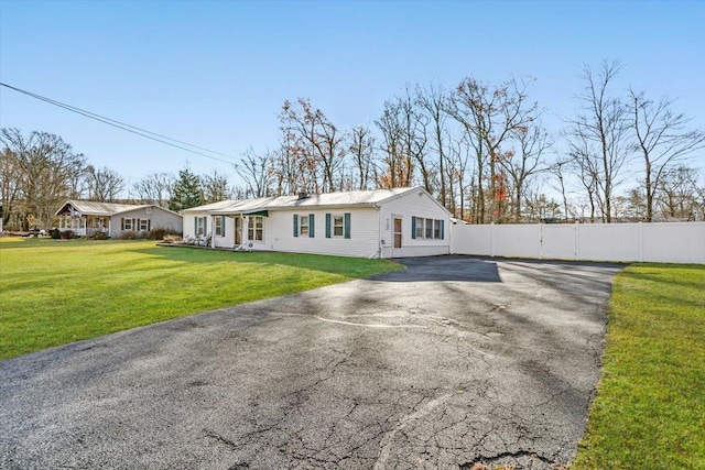 exterior space with a front yard