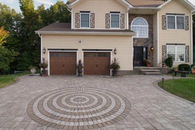 view of front of house with a garage